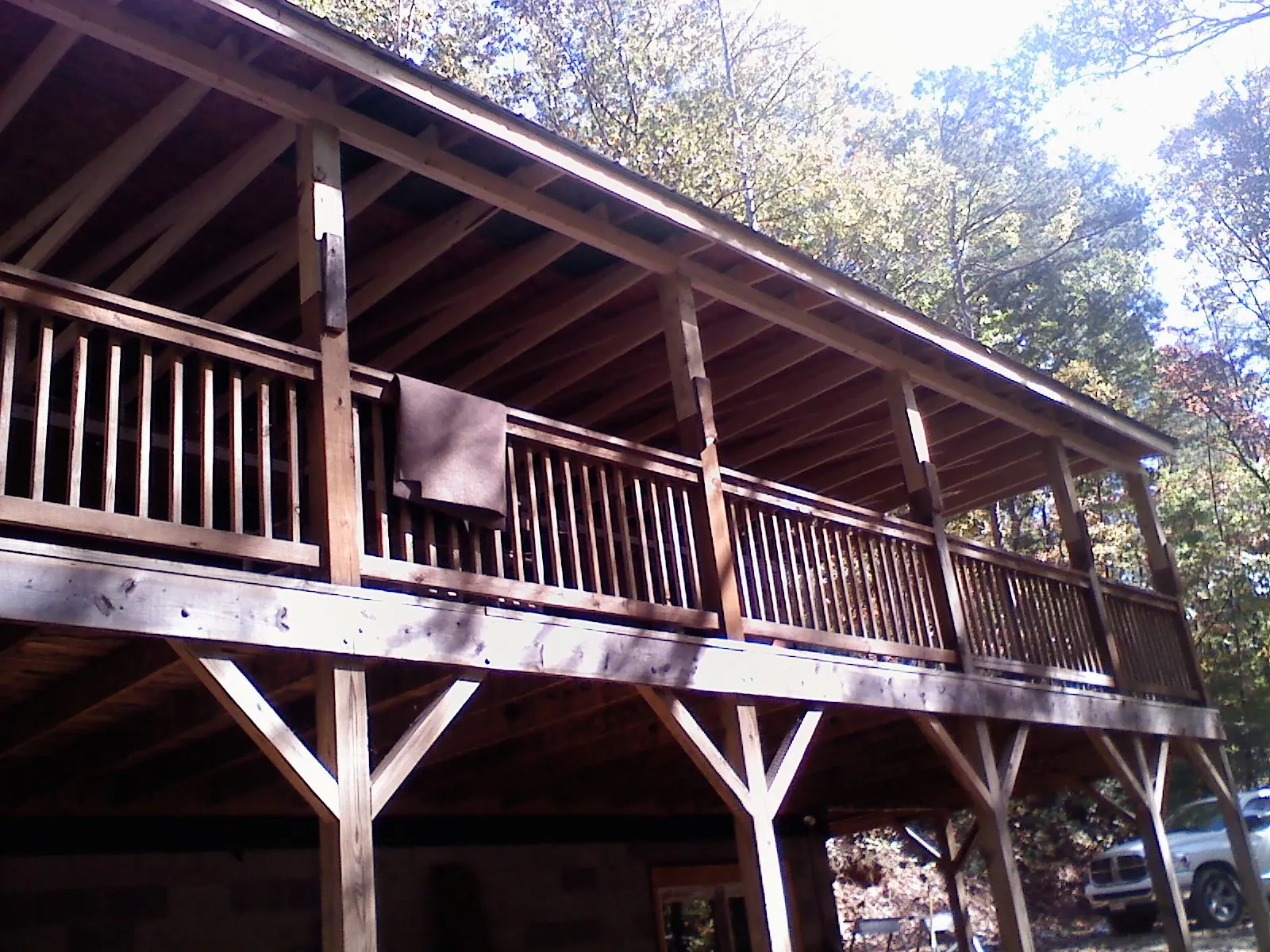 Timber framing under a new elevated porch and deck — Roof Leak Repair in Friendswood by Roofing Brothers